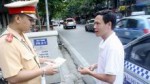 Không được dừng xe đang lưu thông để xử phạt “xe không chính chủ”